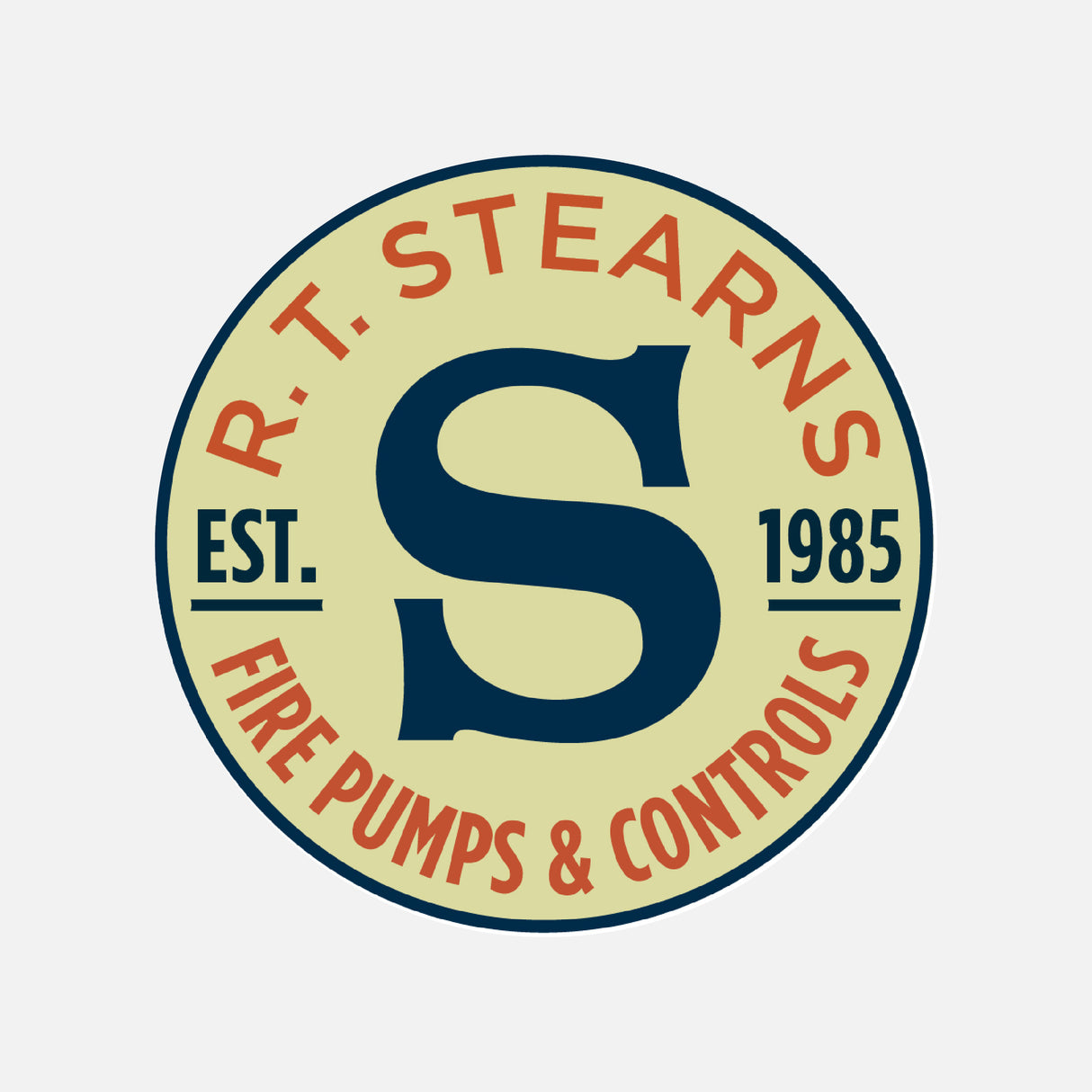 Circular logo featuring a large blue "S" at its center. Encircling text displays "R.T. Stearns" on top and "Fire Pumps & Controls" at the bottom, flanked by the establishment year, "Est. 1985." The cream background is accentuated with red and blue lettering.