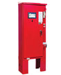 A tall red FD90 – Soft Start from Eaton stands on a platform, resembling a solid-state starter. It features a screen, various buttons, and a handle on the right door. Cables and a document for motor deceleration are attached at the top right corner.